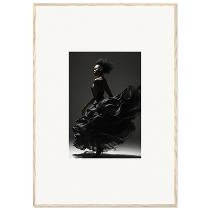 Dancer in a flowing black dress captured mid-twirl against a dark background.