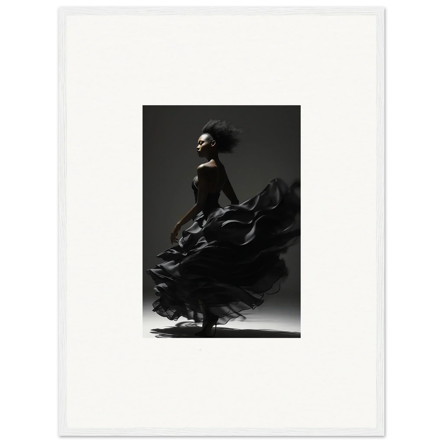 Dramatic black-and-white photograph of a flamenco dancer in motion, her dress swirling around her.