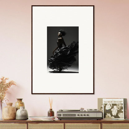 Framed black and white photograph of a flamenco dancer in motion.