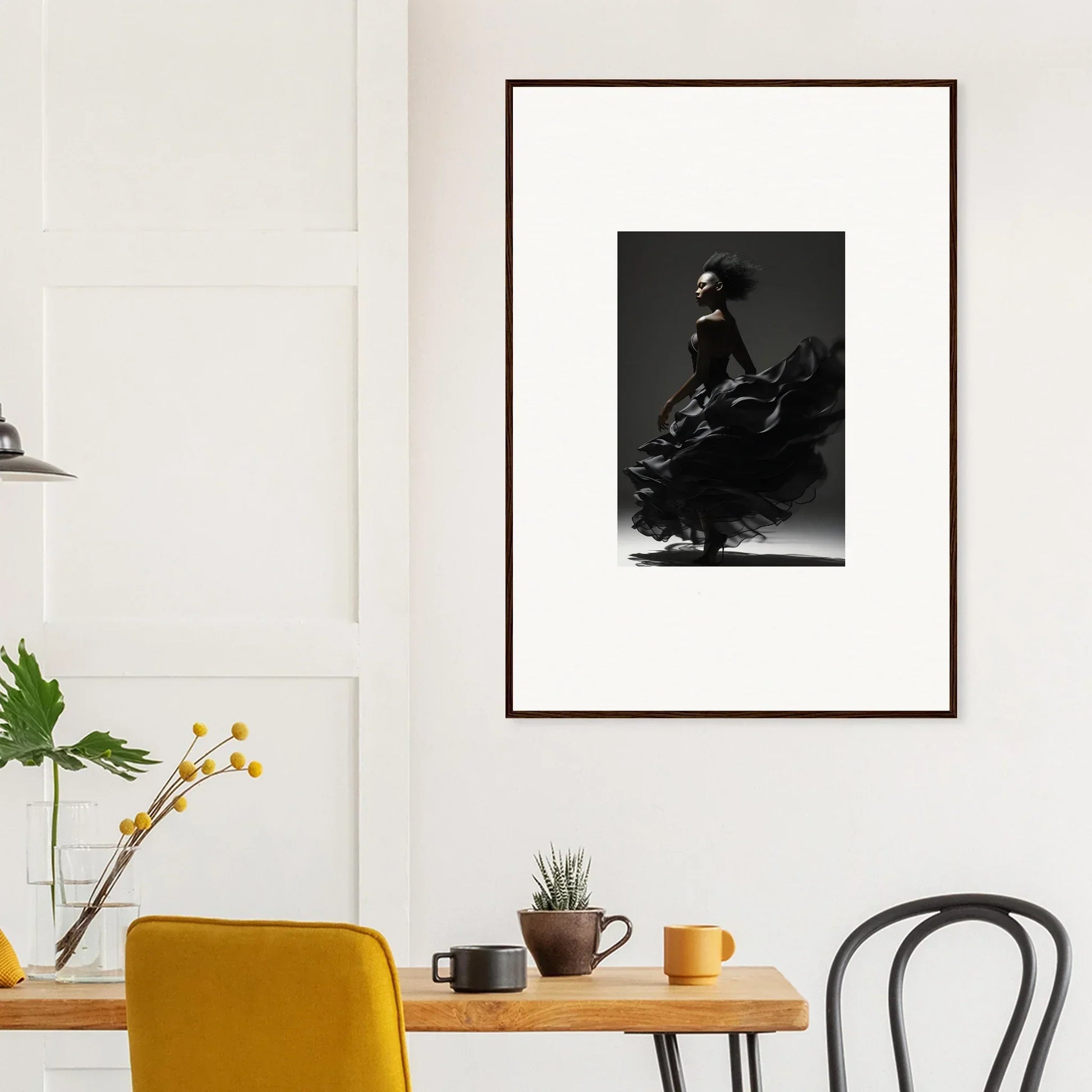 Framed black and white photograph of a flamenco dancer in motion.