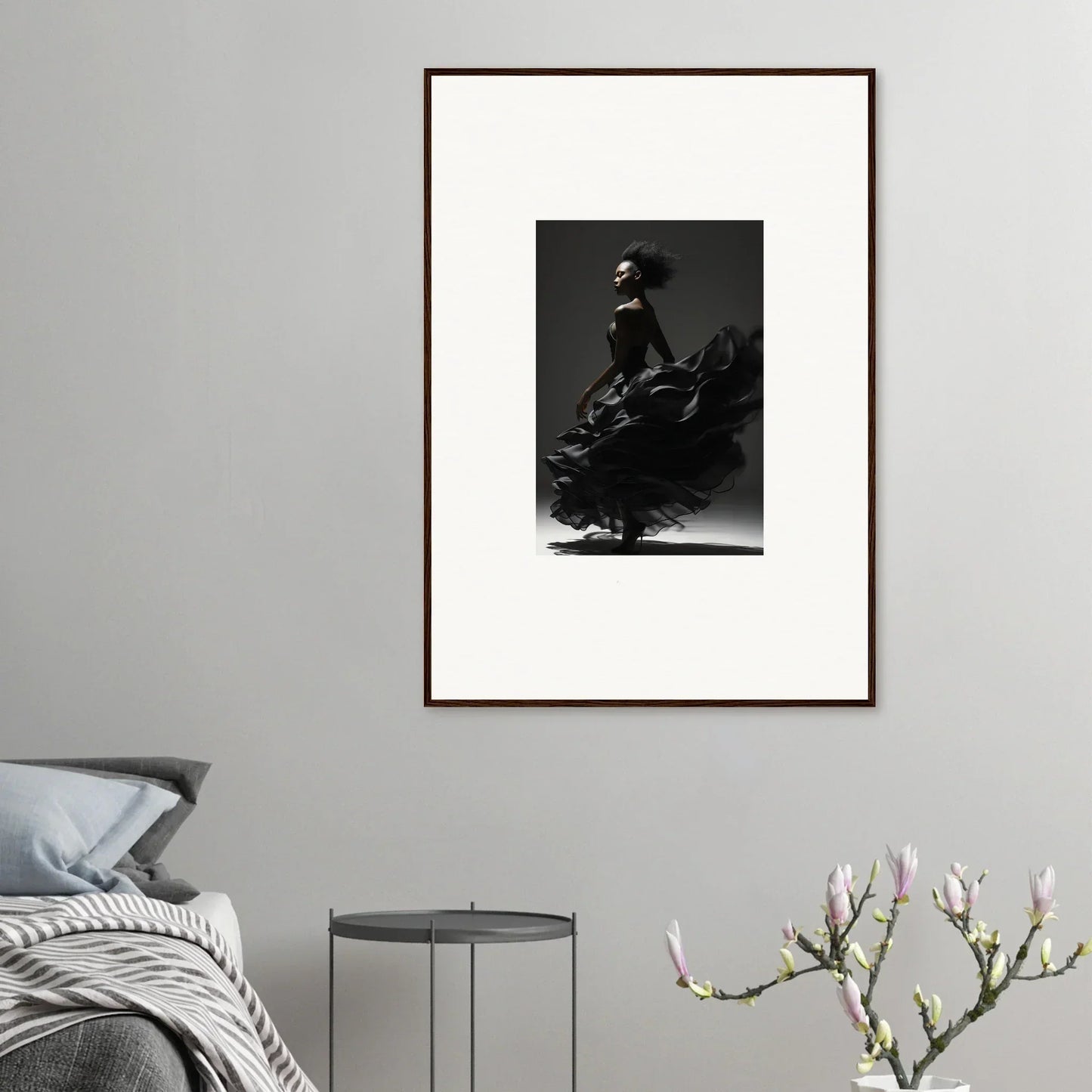 Framed black and white photograph of a flamenco dancer in motion.