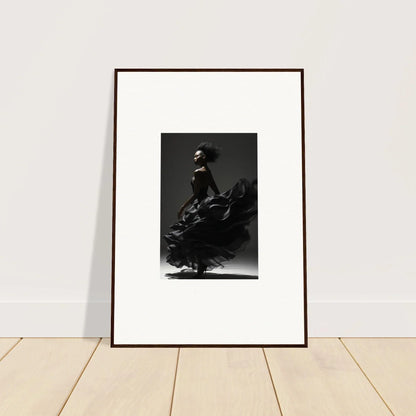 Framed black and white photograph of a flamenco dancer in motion.