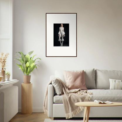 Framed black and white photograph of a figure in a white dress for elegant room decor