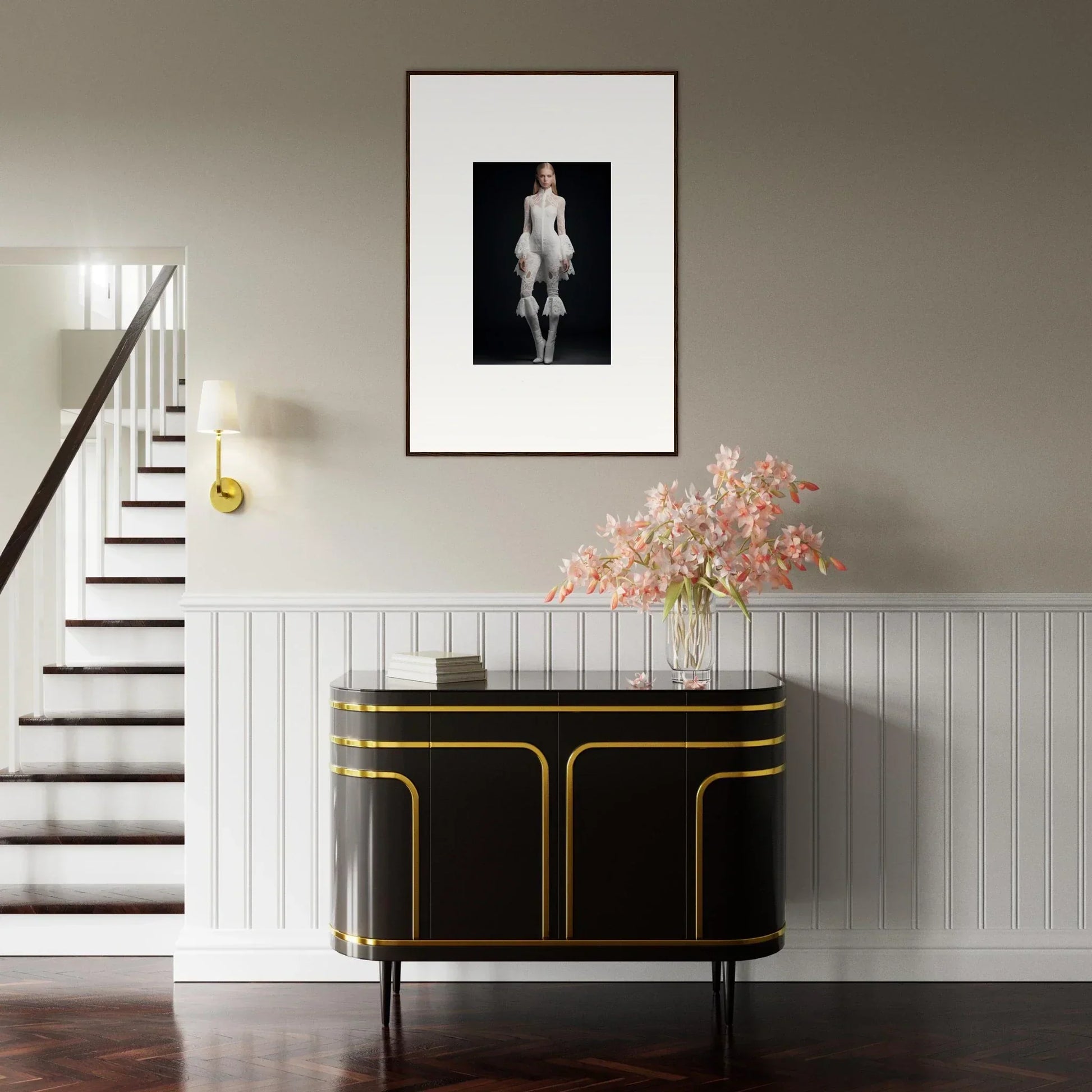 Elegant black sideboard with gold trim enhances room decor alongside canvas prints