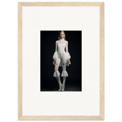 Framed wall art of a person in an avant-garde white outfit for stylish room decor