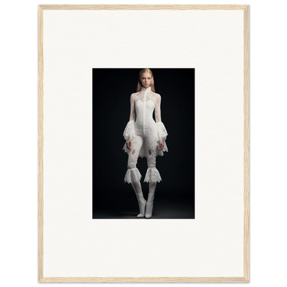 Framed wall art of a person in avant-garde white outfit, perfect for room decor