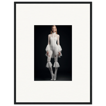 Framed wall art of a woman in an all-white avant-garde outfit for elegant room decor