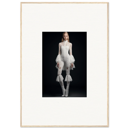 Framed wall art featuring a person in an avant-garde white outfit for stylish room decor