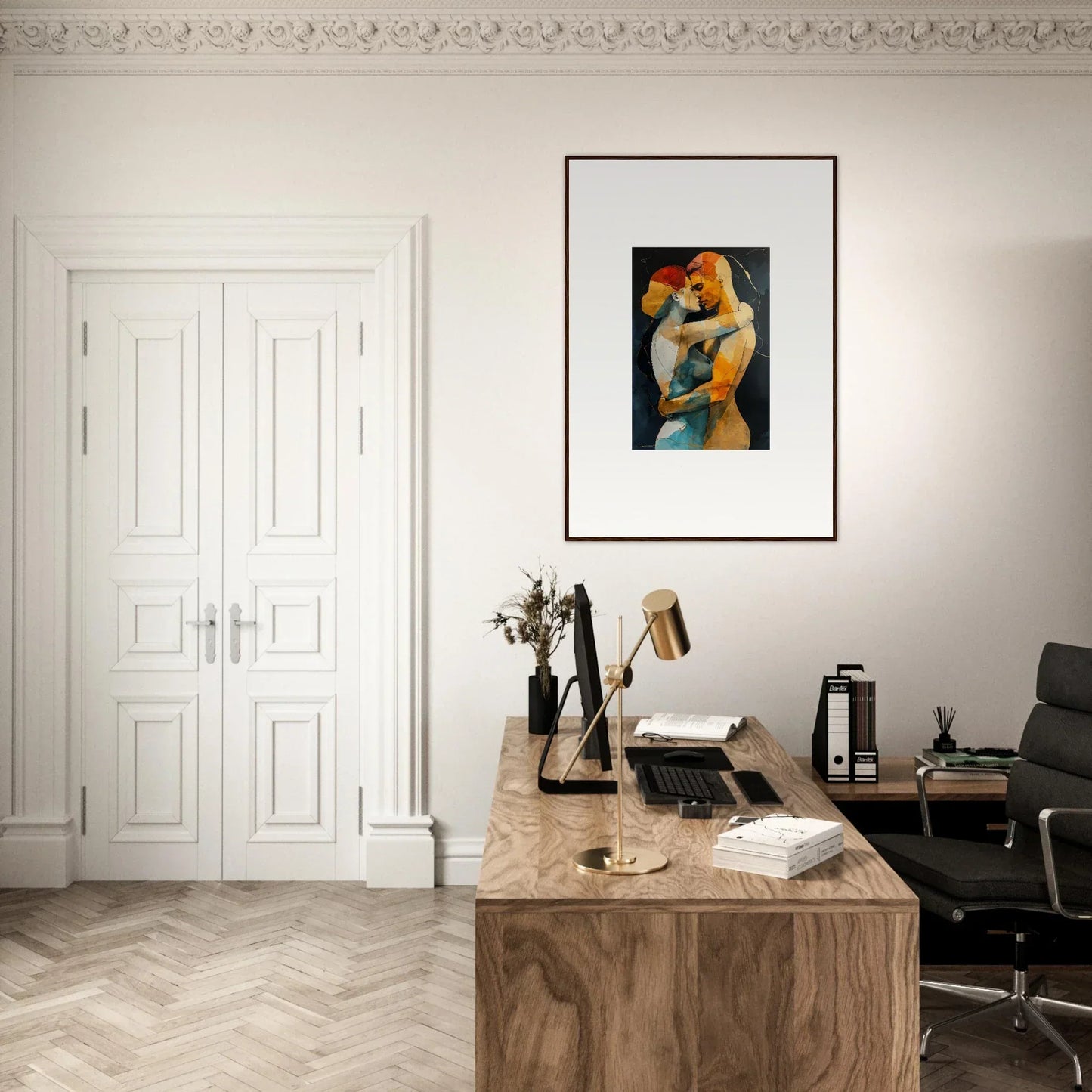 Home office workspace with wooden desk, chair, and Embrace Waves framed wall art