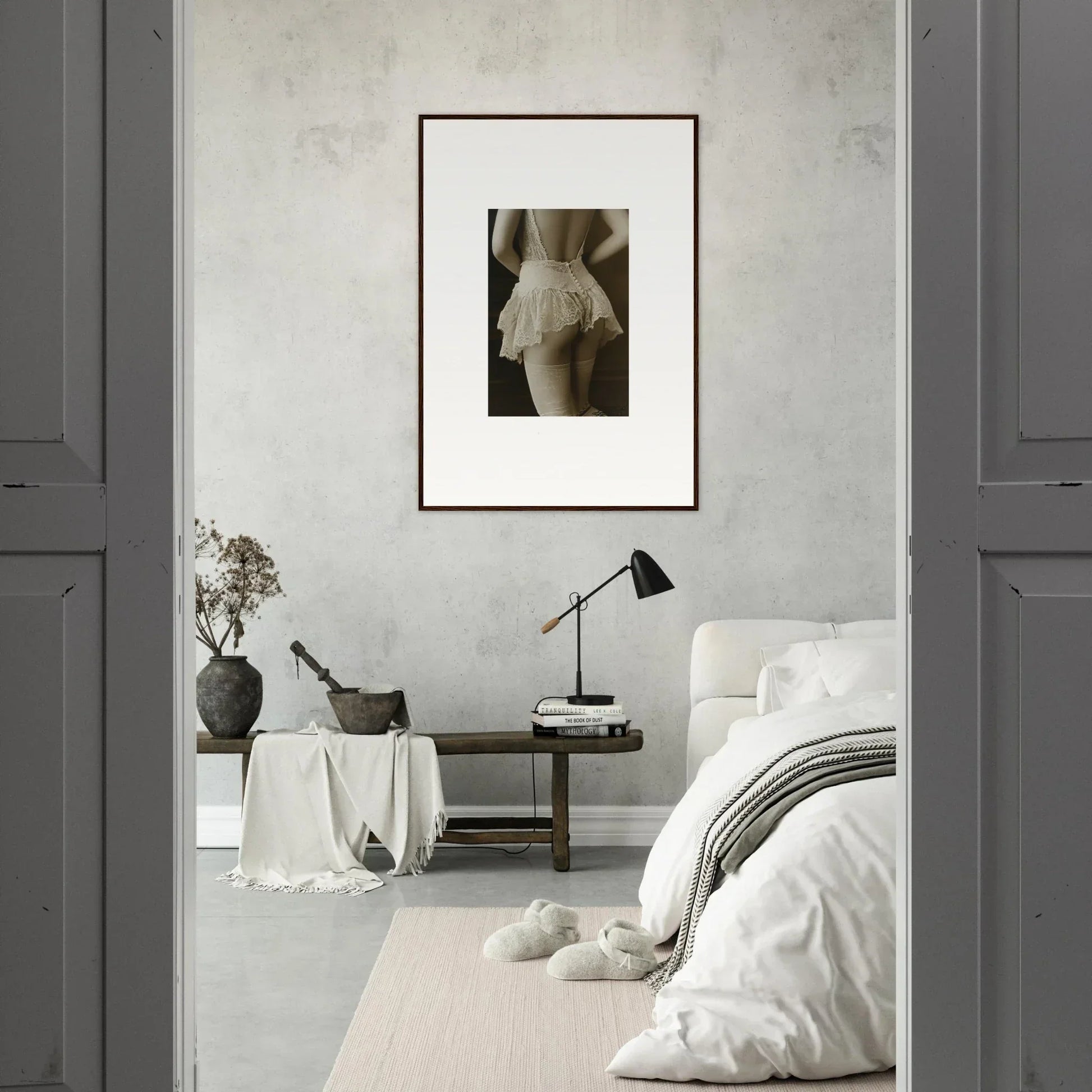 Framed black and white wall art of a person’s lower back for chic room decoration