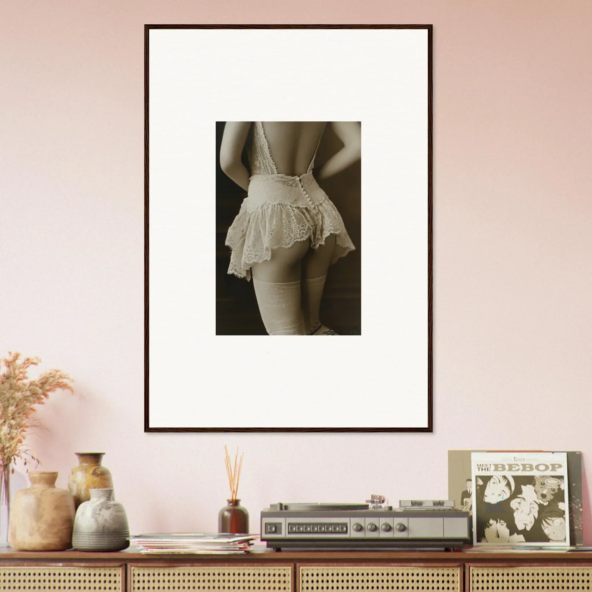 Framed black and white canvas print of a person in vintage-style underwear for wall art