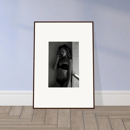 Framed black and white photograph of a woman in a bikini.