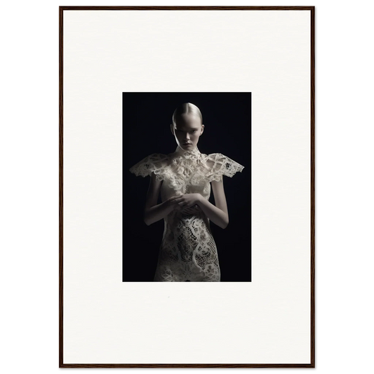 Framed black and white wall art of a figure in ornate white garment, Lace Echoes decor