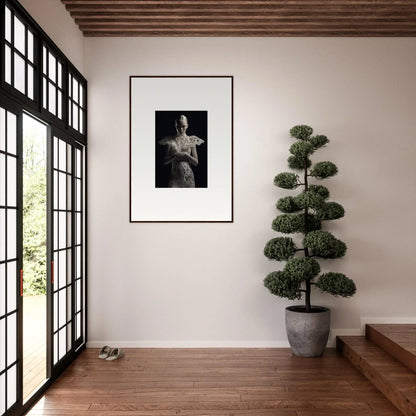 Framed black and white photograph of a person enhancing lace echoes room decor