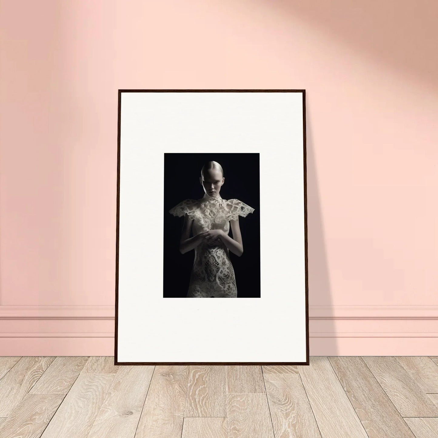 Framed wall art of a figure in an ornate dress for elegant room decor with lace echoes