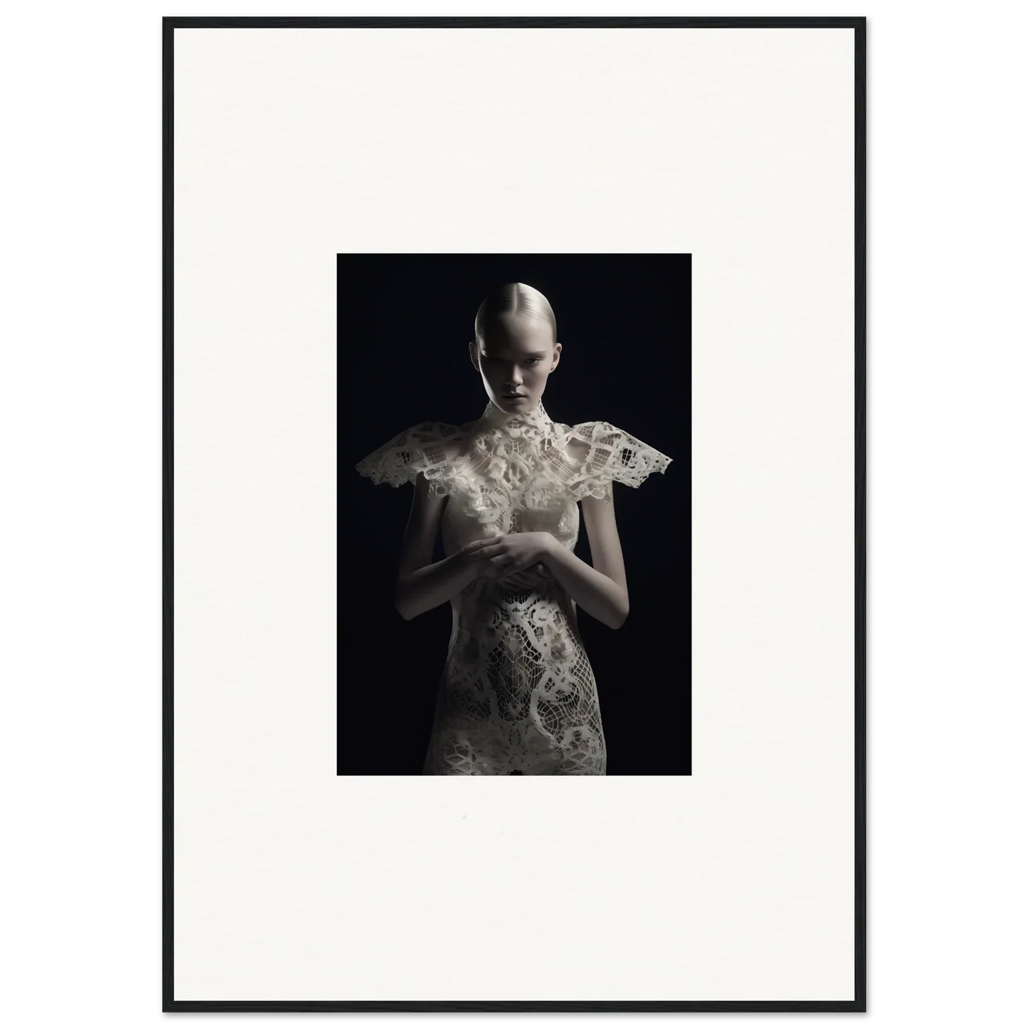 Black and white photo of a figure in ornate lace echoes garment, ideal for room decor