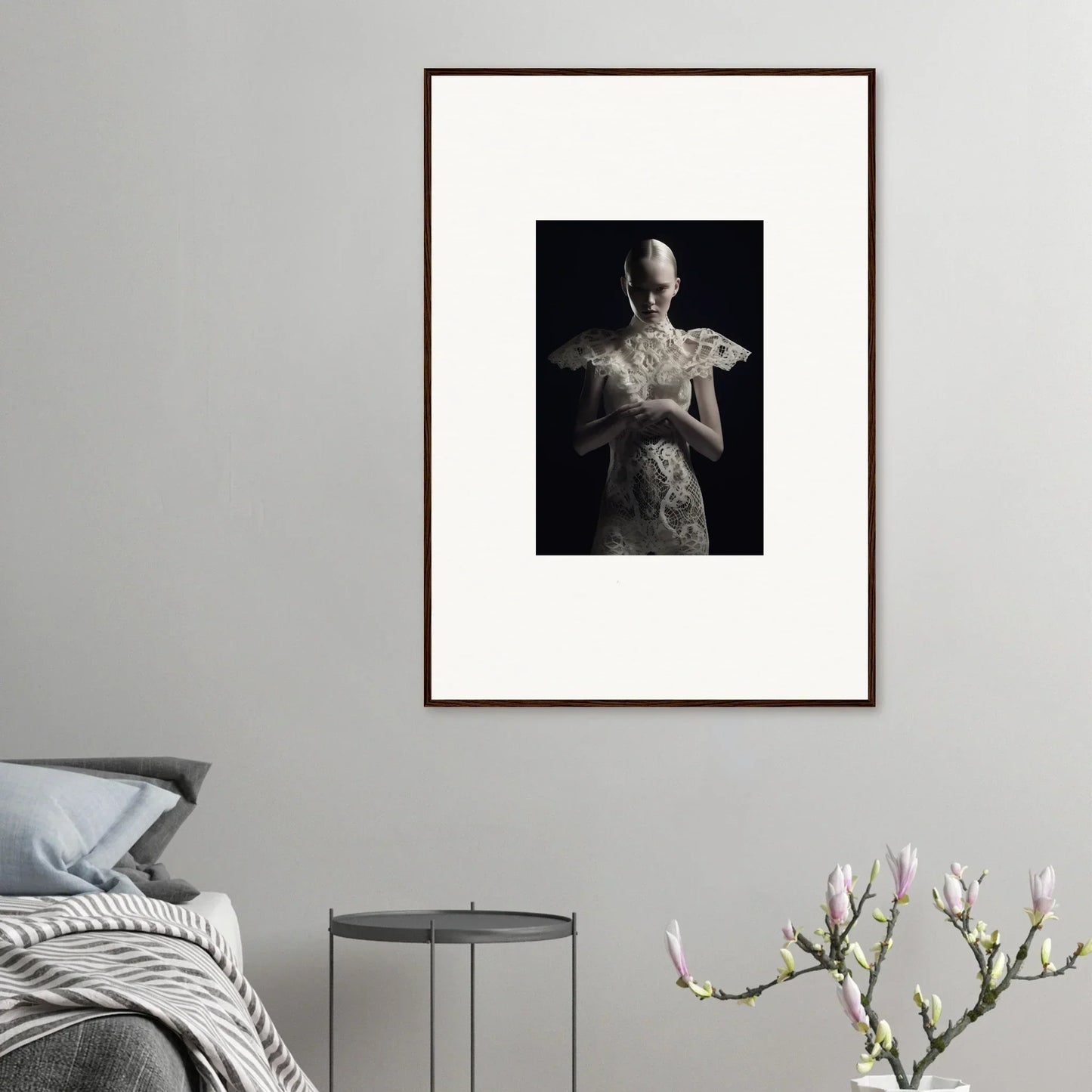 Framed wall art featuring black and white figure with lace echoes body art design