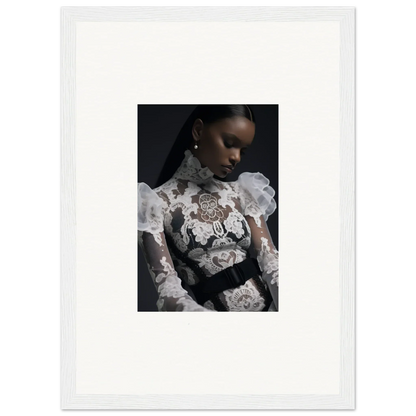 Portrait of a woman wearing an ornate white lace top against a dark background.