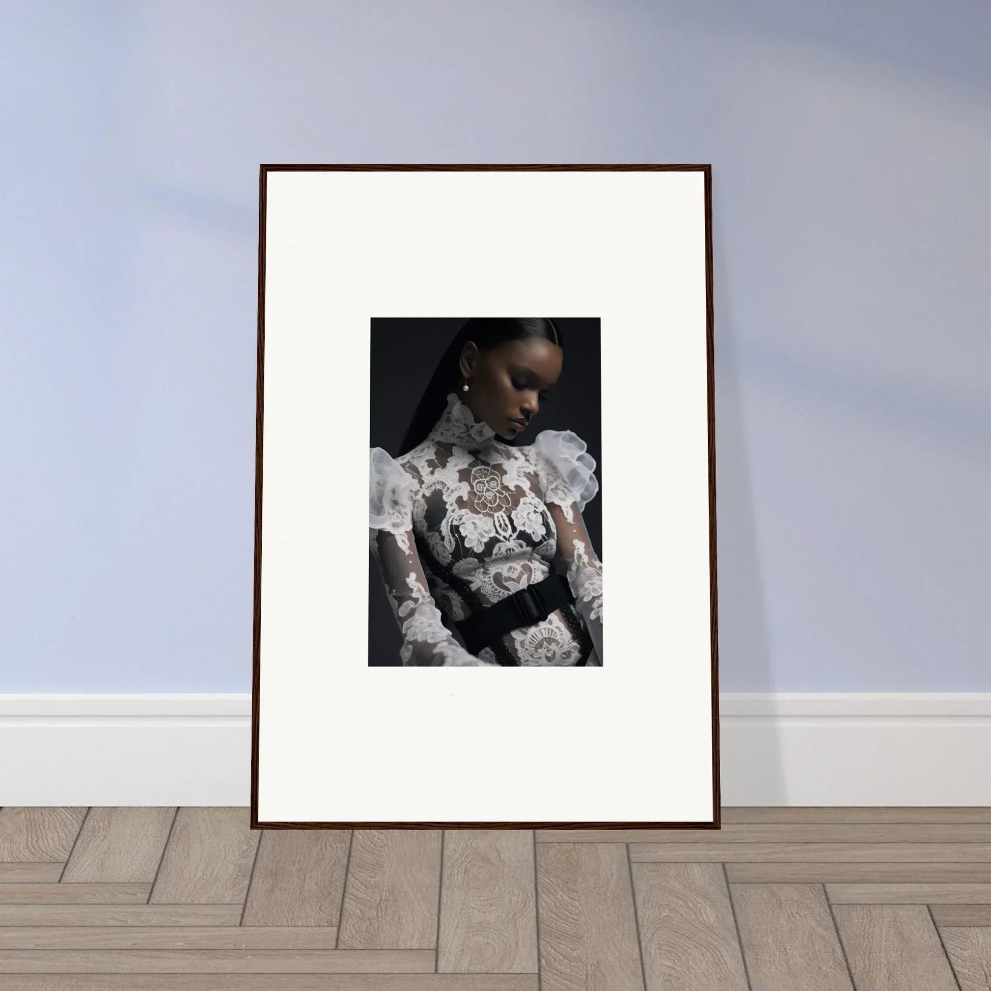 Framed portrait photograph of a person wearing an ornate floral garment.