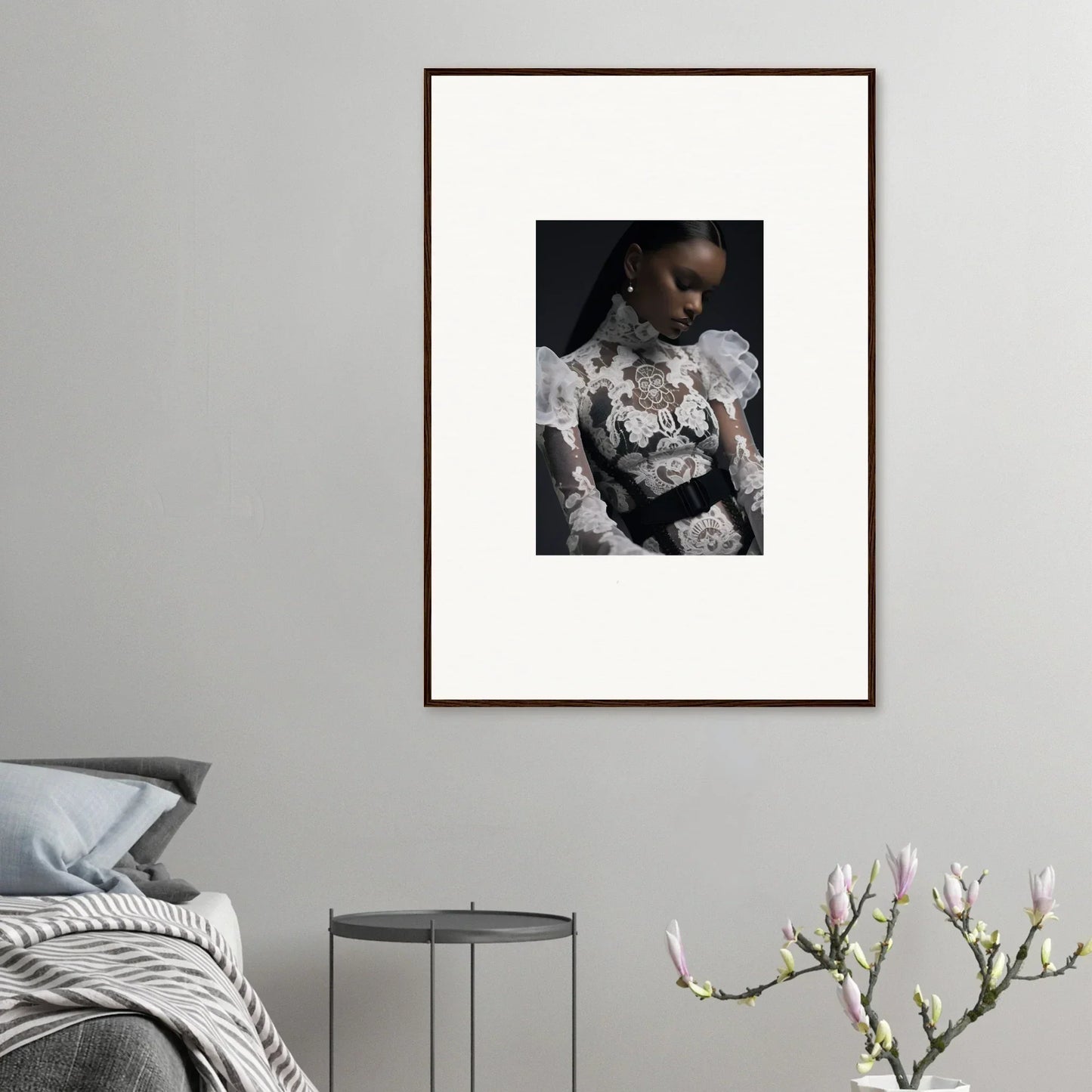 Framed portrait photograph of a person wearing an ornate white floral top.