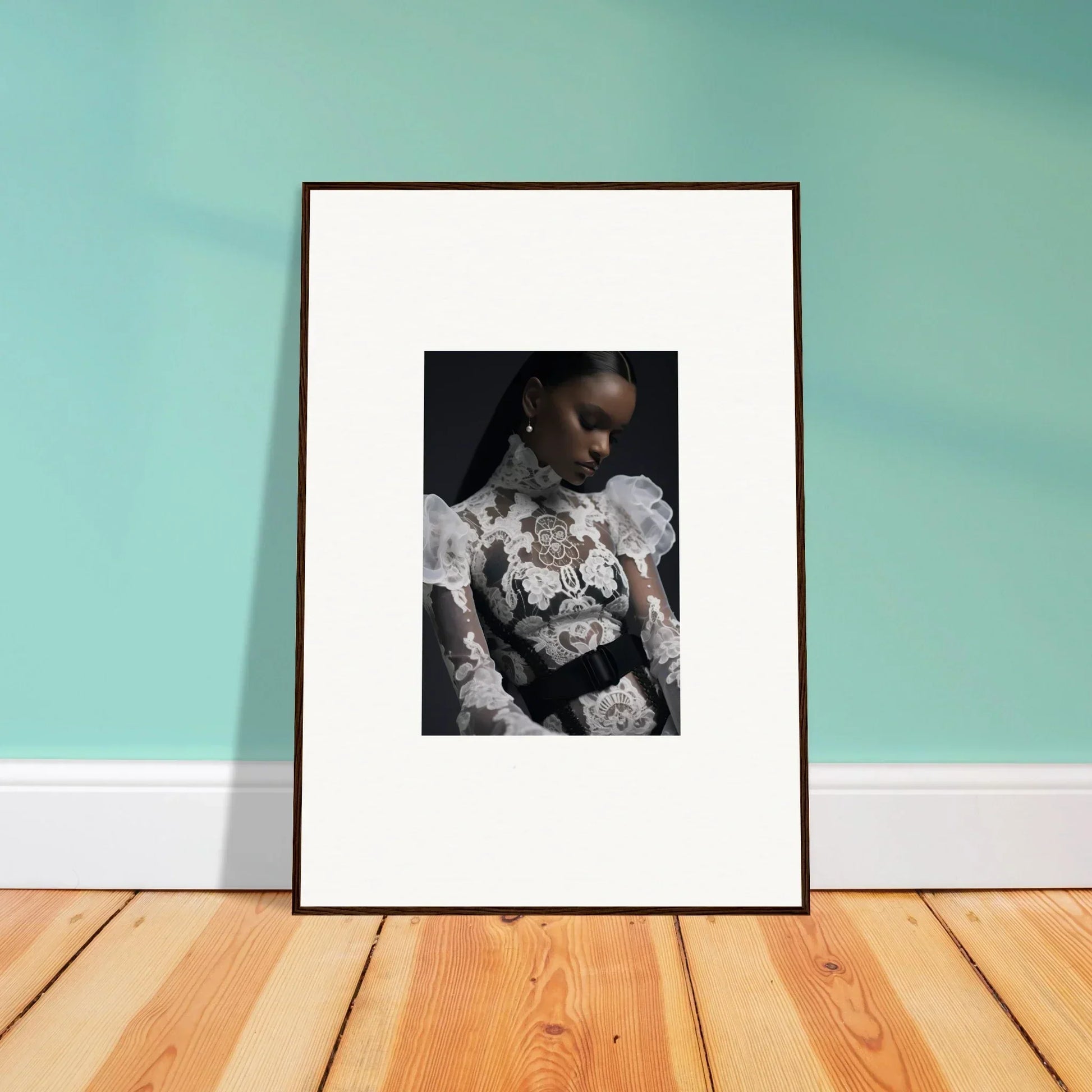 Framed black and white photograph of a person with intricate body art or tattoos.