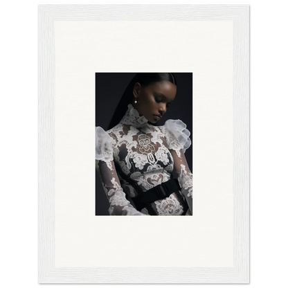 Portrait photograph of a woman wearing an ornate white lace top with floral embroidery.