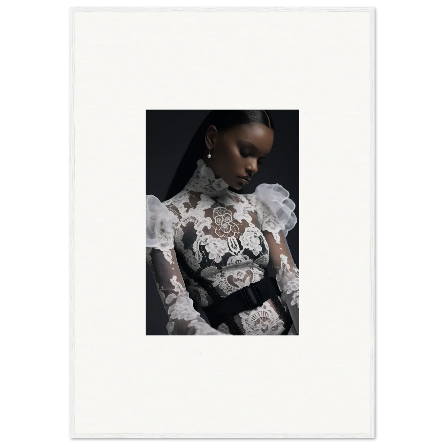 Portrait photograph of a woman wearing an intricately detailed white lace top against a dark background.