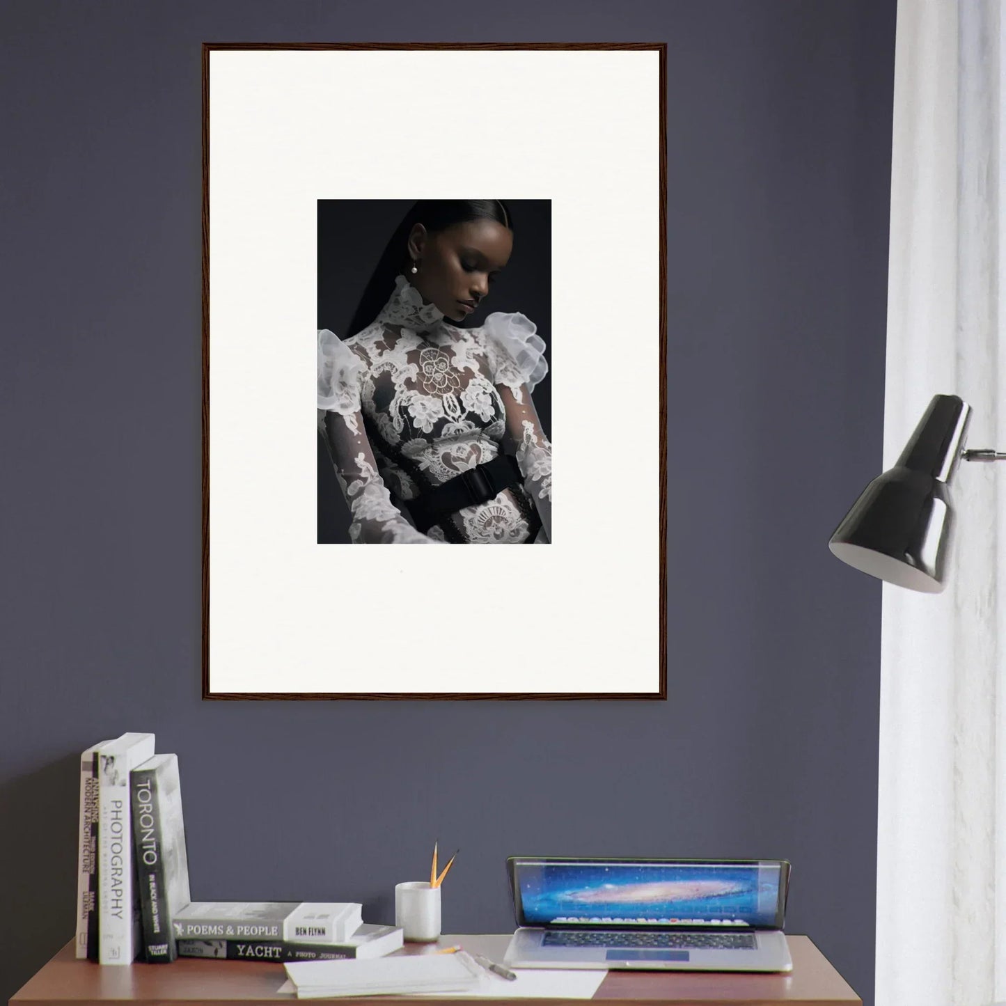 Framed portrait photograph of a person wearing an intricate white lace top against a dark background.