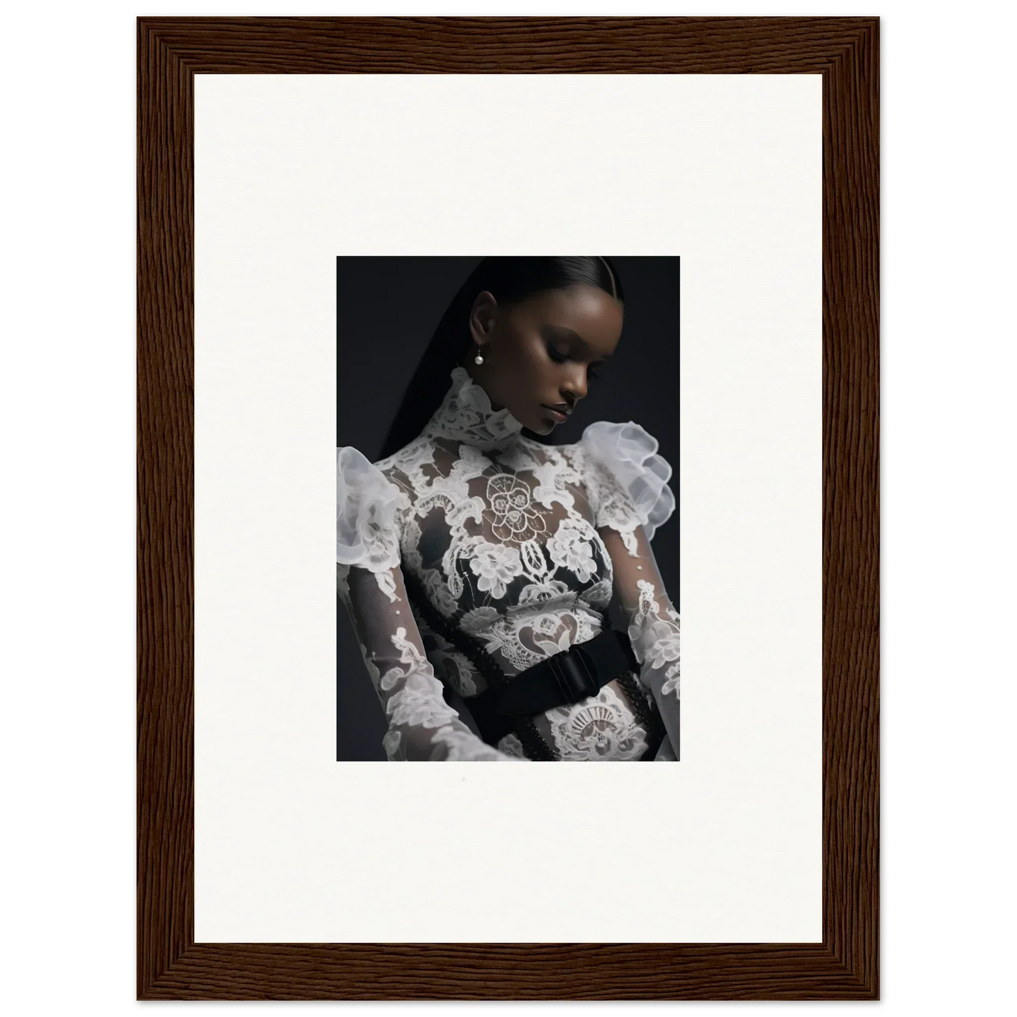 Framed portrait photograph of a woman wearing an ornate white lace top against a dark background.