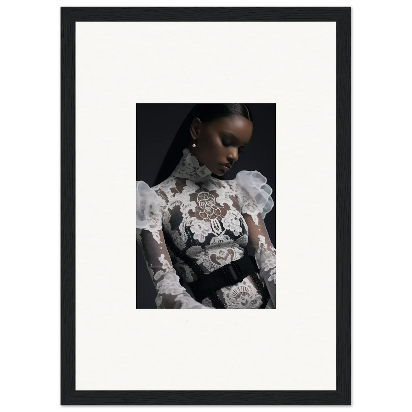 Portrait of a woman wearing an ornate white lace and floral-embroidered top against a dark background.