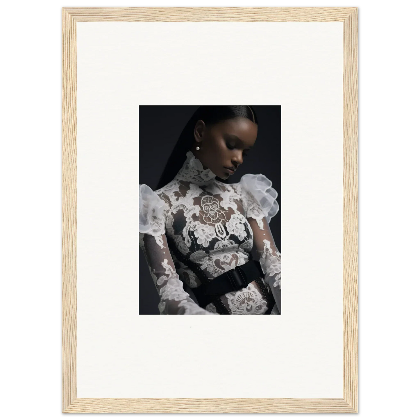 Framed portrait photograph of a woman wearing an ornate white lace top against a dark background.