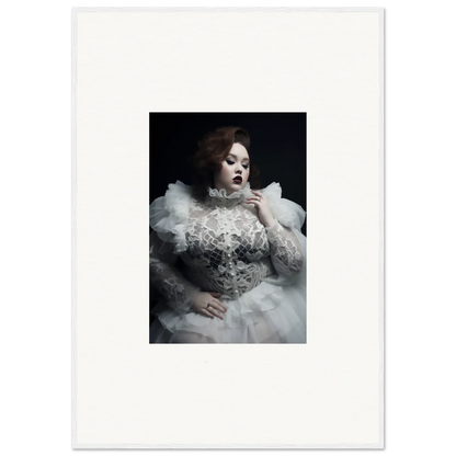 Dramatic portrait of a woman in an ornate white gown with voluminous ruffles and lace details.