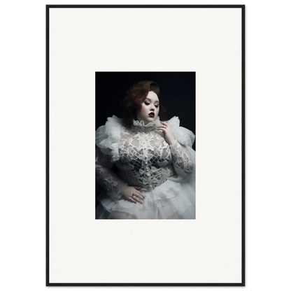 Dramatic portrait of a woman in an ornate white gown with voluminous ruffles and lace details.