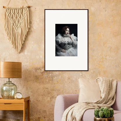 Framed black and white portrait photograph of a woman in an elegant dress.