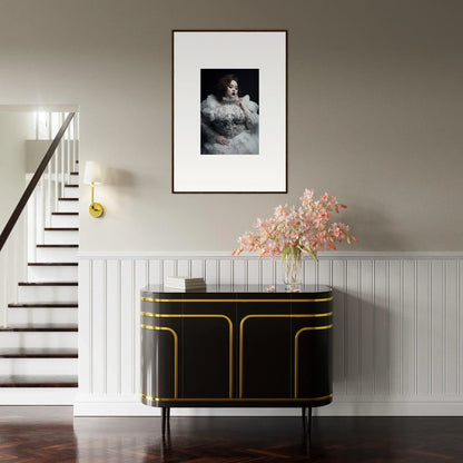 Elegant black and gold sideboard with curved edges and cabinet doors.