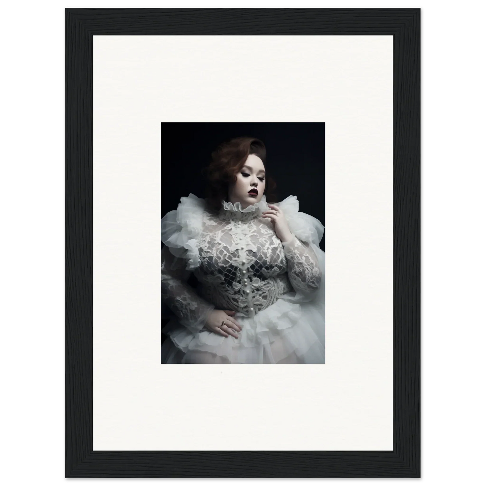 Framed portrait of a woman in an elaborate white gown with voluminous ruffles and lace details.