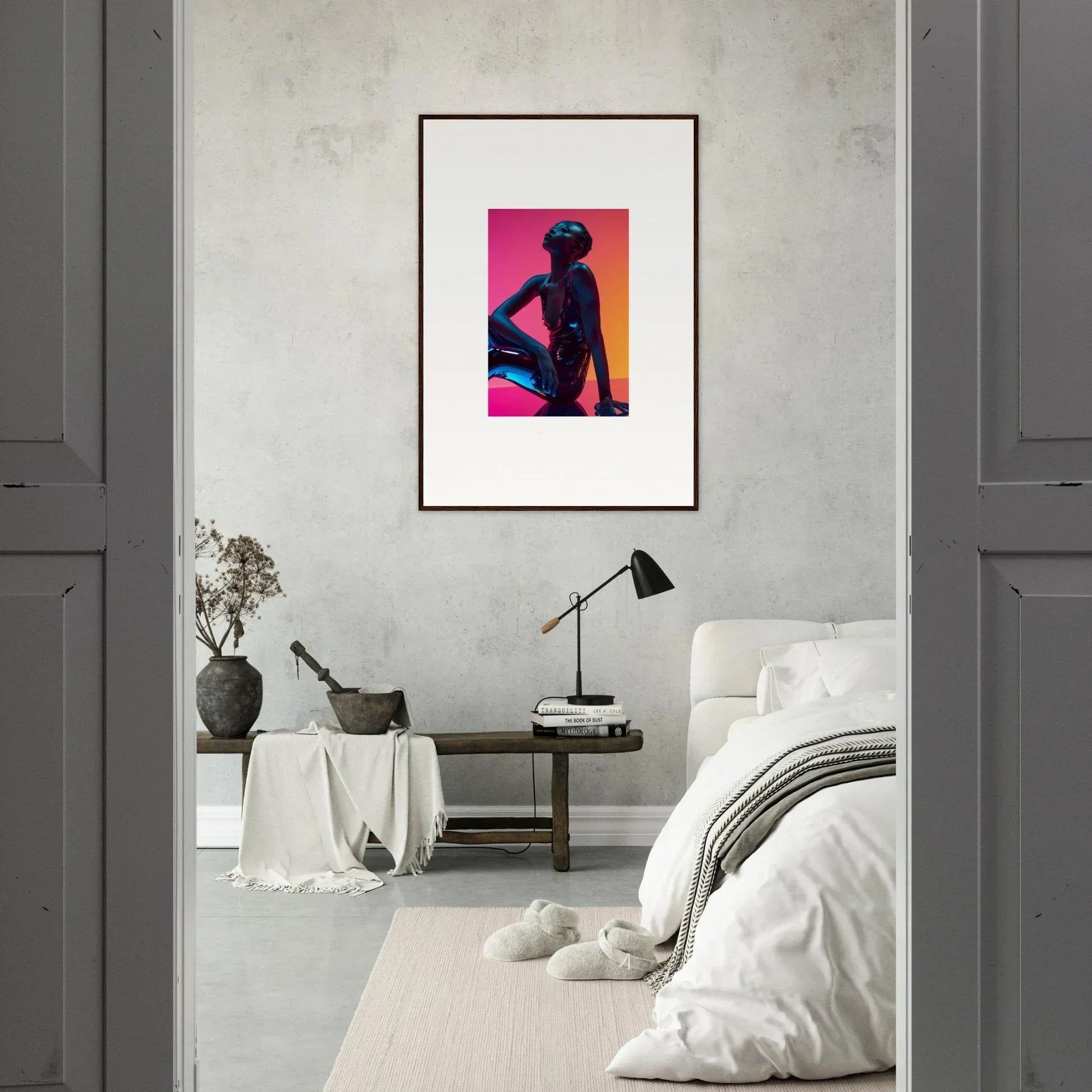 Framed wall art of a silhouetted figure with neon echoes in vibrant pink and orange