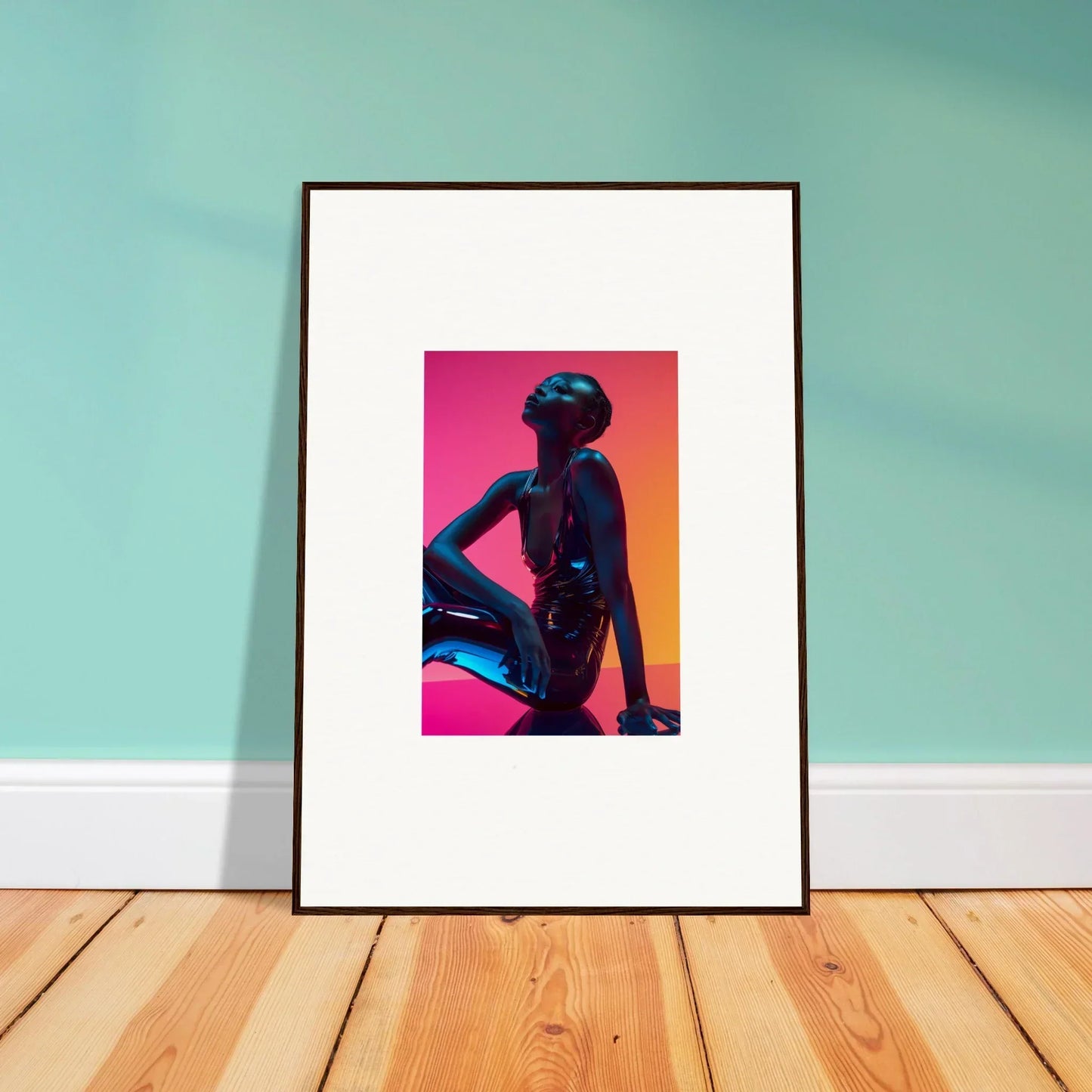 Framed wall art of a silhouette on a vibrant gradient, perfect for room decor with neon echoes