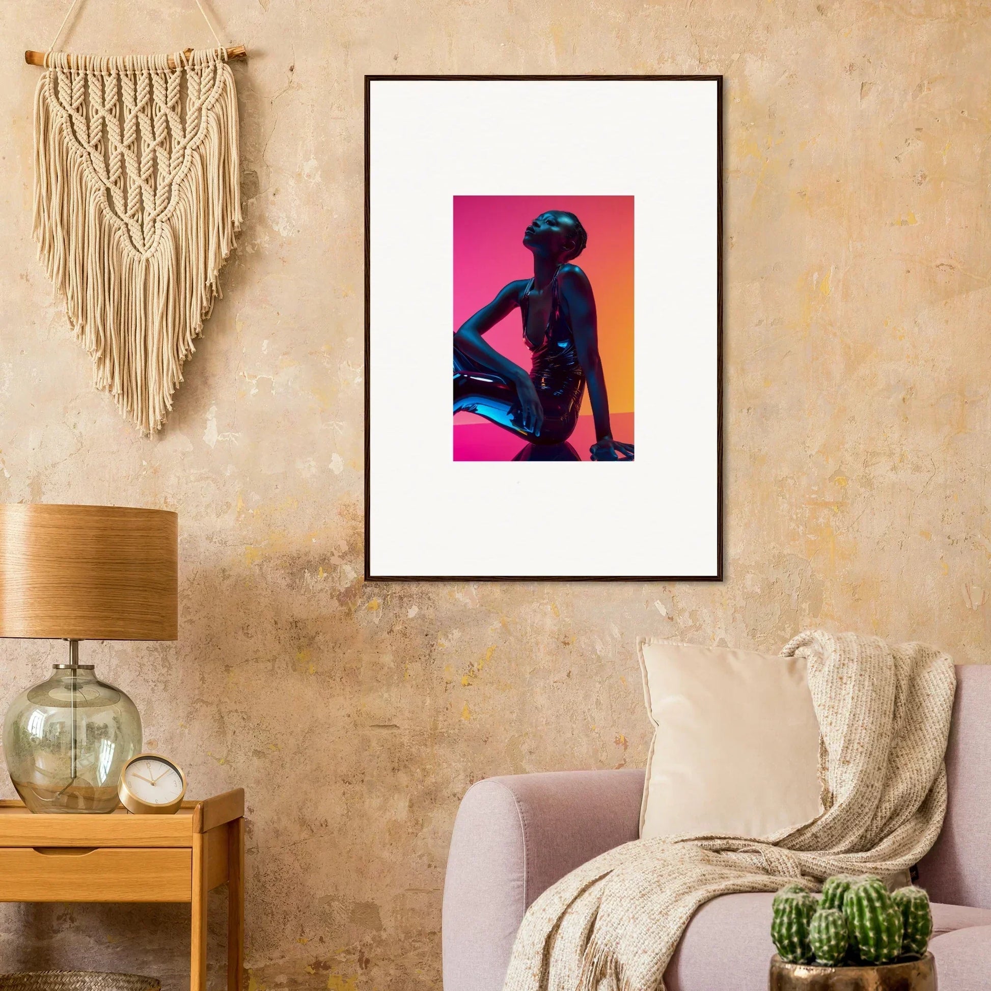 Framed wall art featuring a silhouetted figure on a vibrant pink neon echoes backdrop