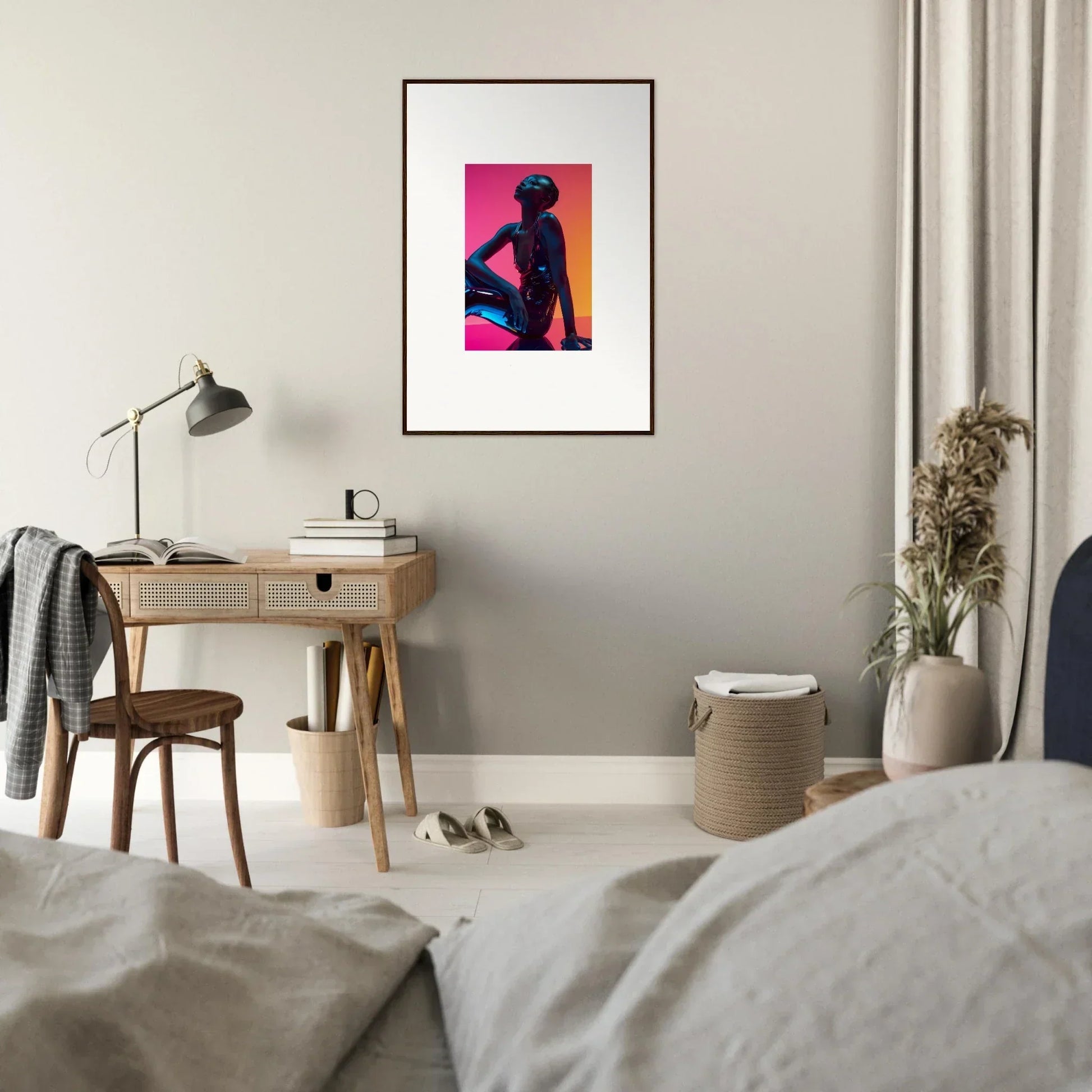 Framed wall art featuring a silhouetted figure in vibrant pink and orange neon echoes