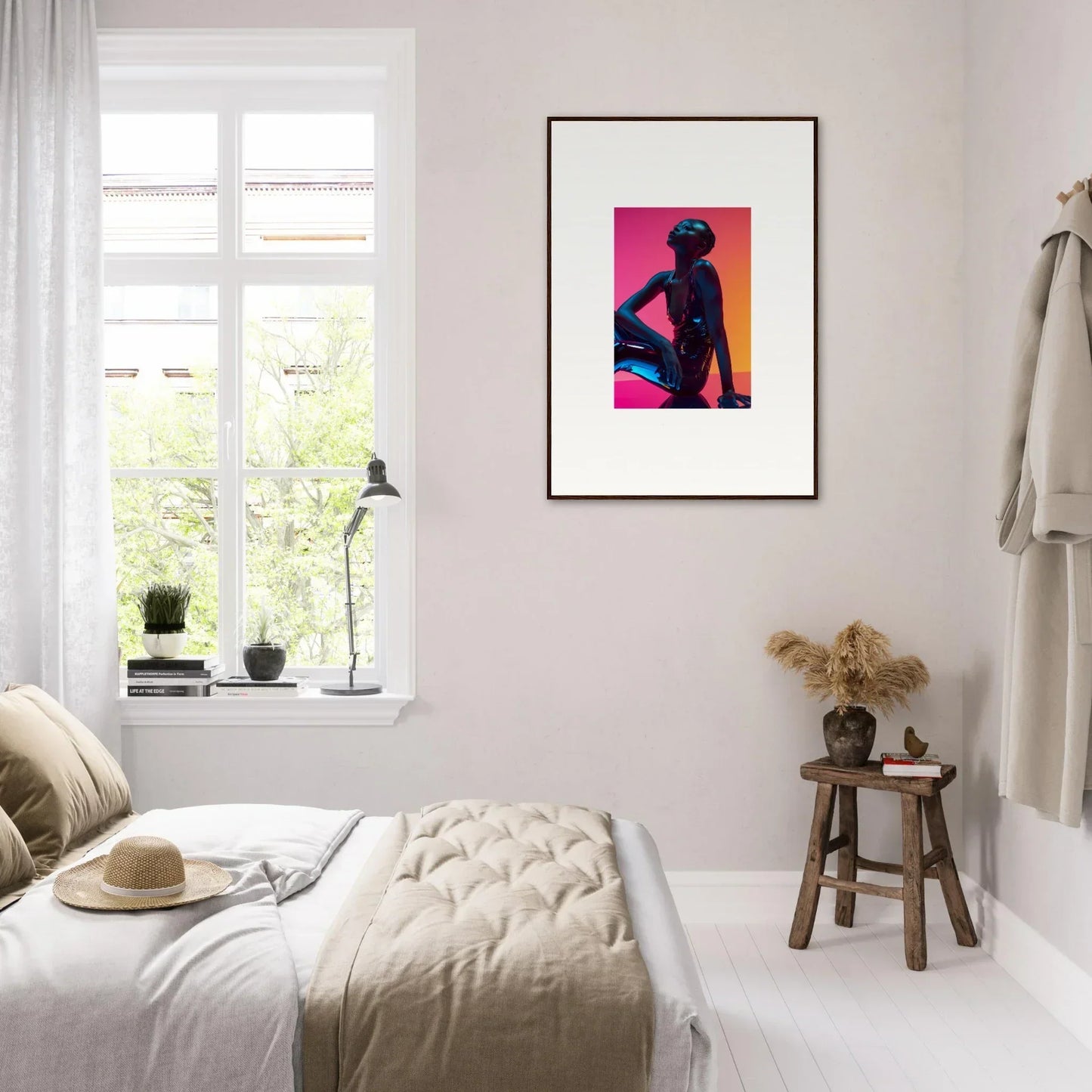 Framed wall art of a silhouetted figure with neon echoes in vibrant room decor