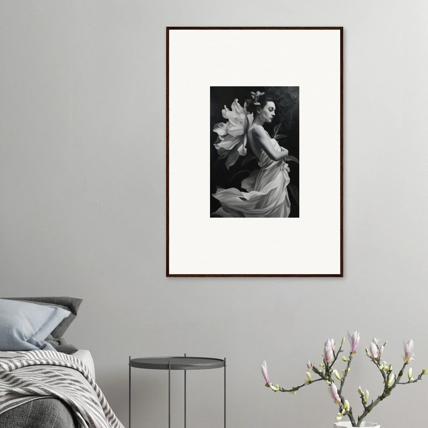 Framed black and white photograph of a person with a large flower for ethereal madness room decor