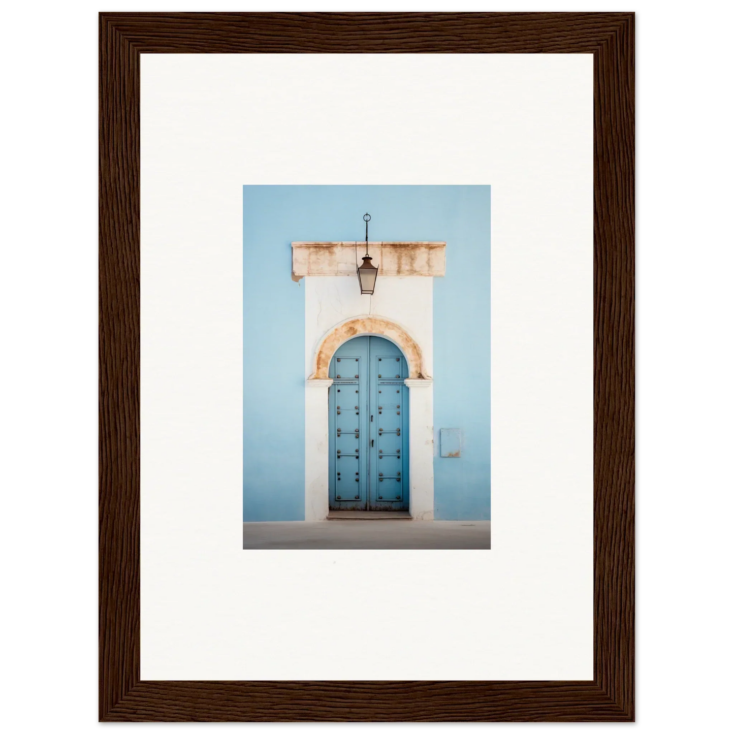 Ornate blue wooden door with metal studs in a white stone arch from Ethereal Portals Imagined