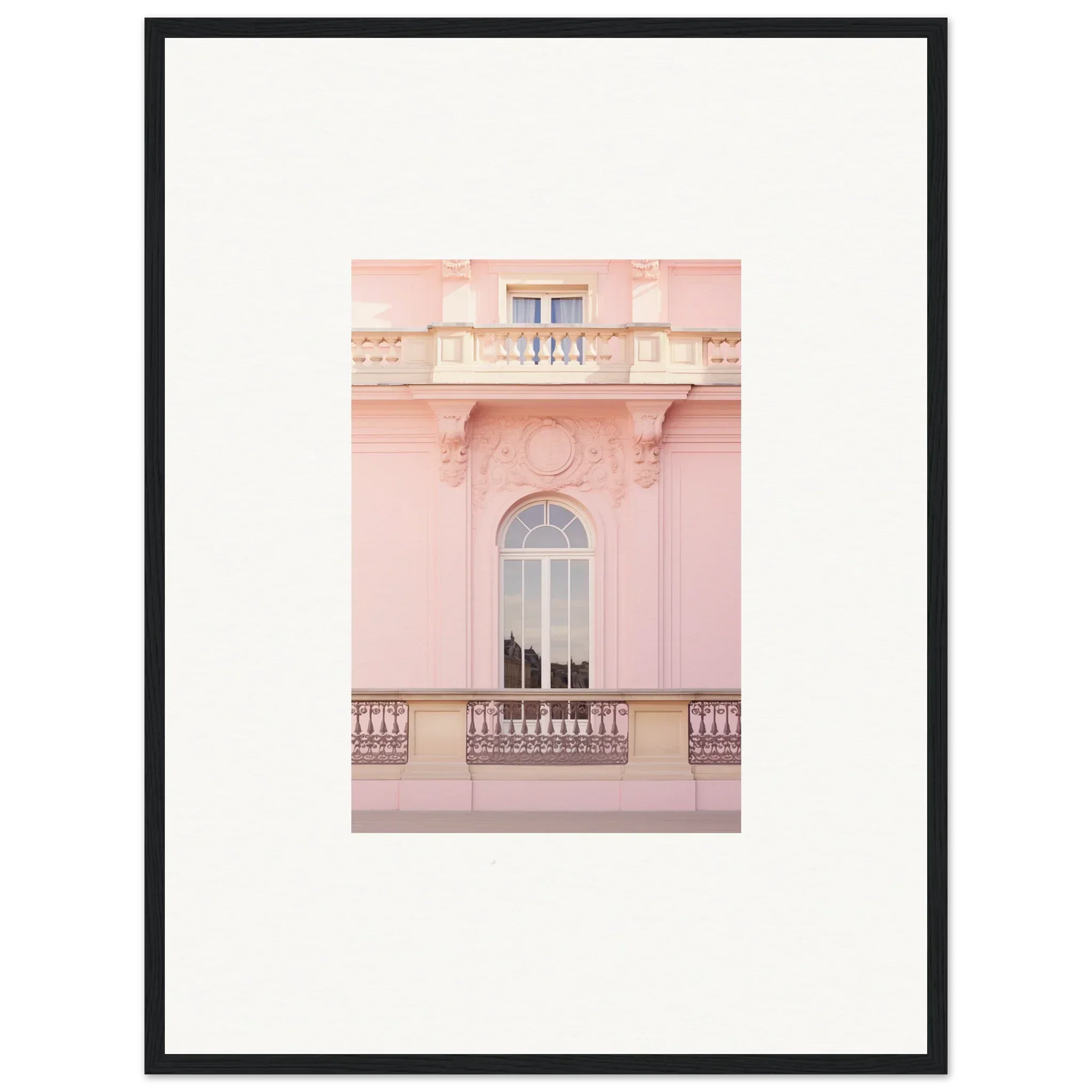 Arched window with ornate balcony on a pink building, perfect for Ethereal Rose Whispers