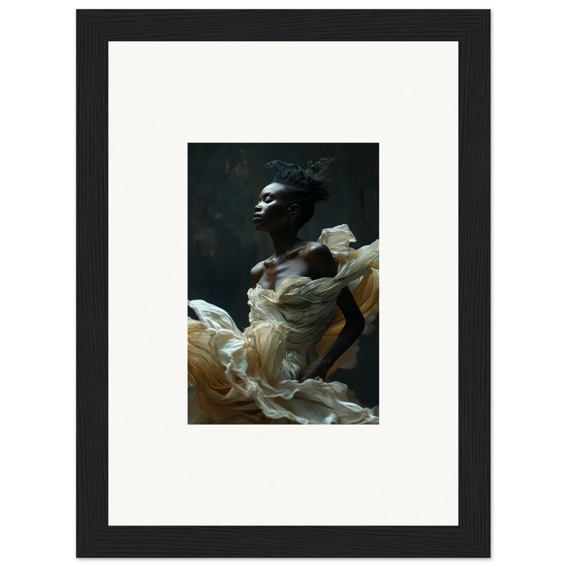 Framed portrait photograph of a person wearing flowing white fabric against a dark background.