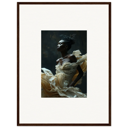 Framed portrait photograph of a person wearing flowing white fabric against a dark background.