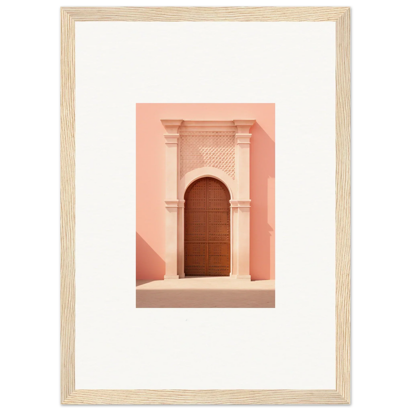 Beautiful wooden door in ornate stone archway on a pink wall for Ethereal Sun Portal