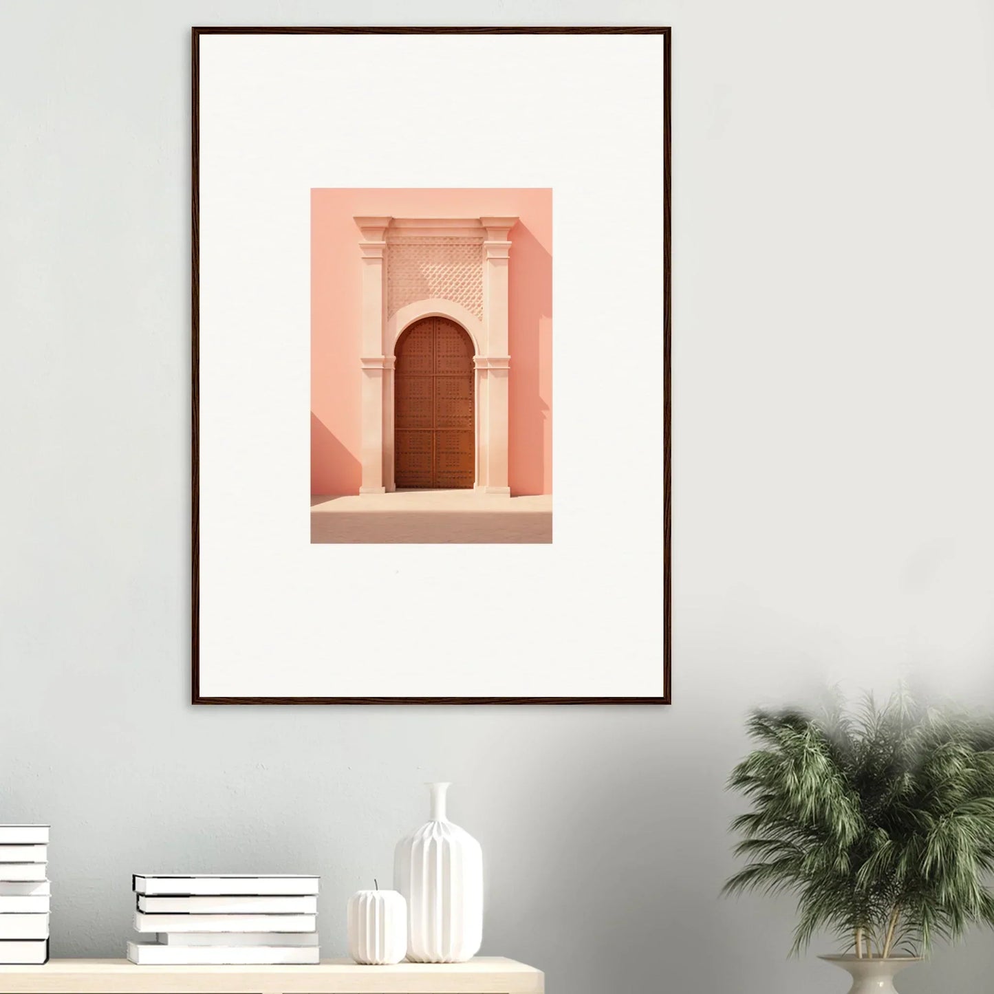 Framed art print of a pink archway and wooden door from Ethereal Sun Portal