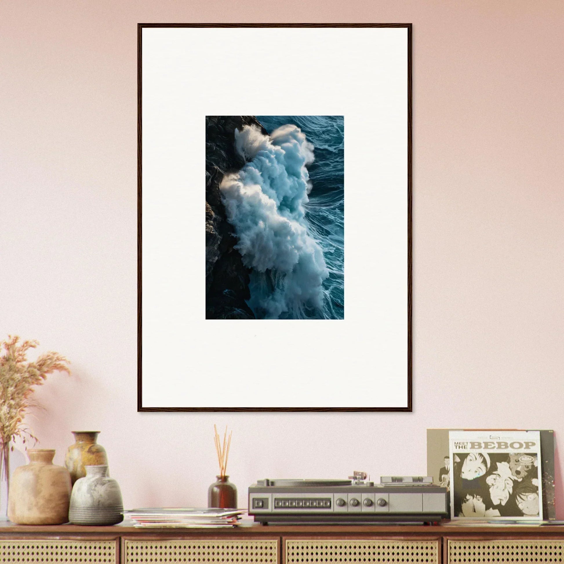 Framed ocean waves crashing against rocks, perfect wall art for room decoration