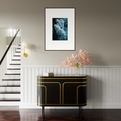 Elegant black and gold sideboard with ocean wave wall art in stylish room decoration